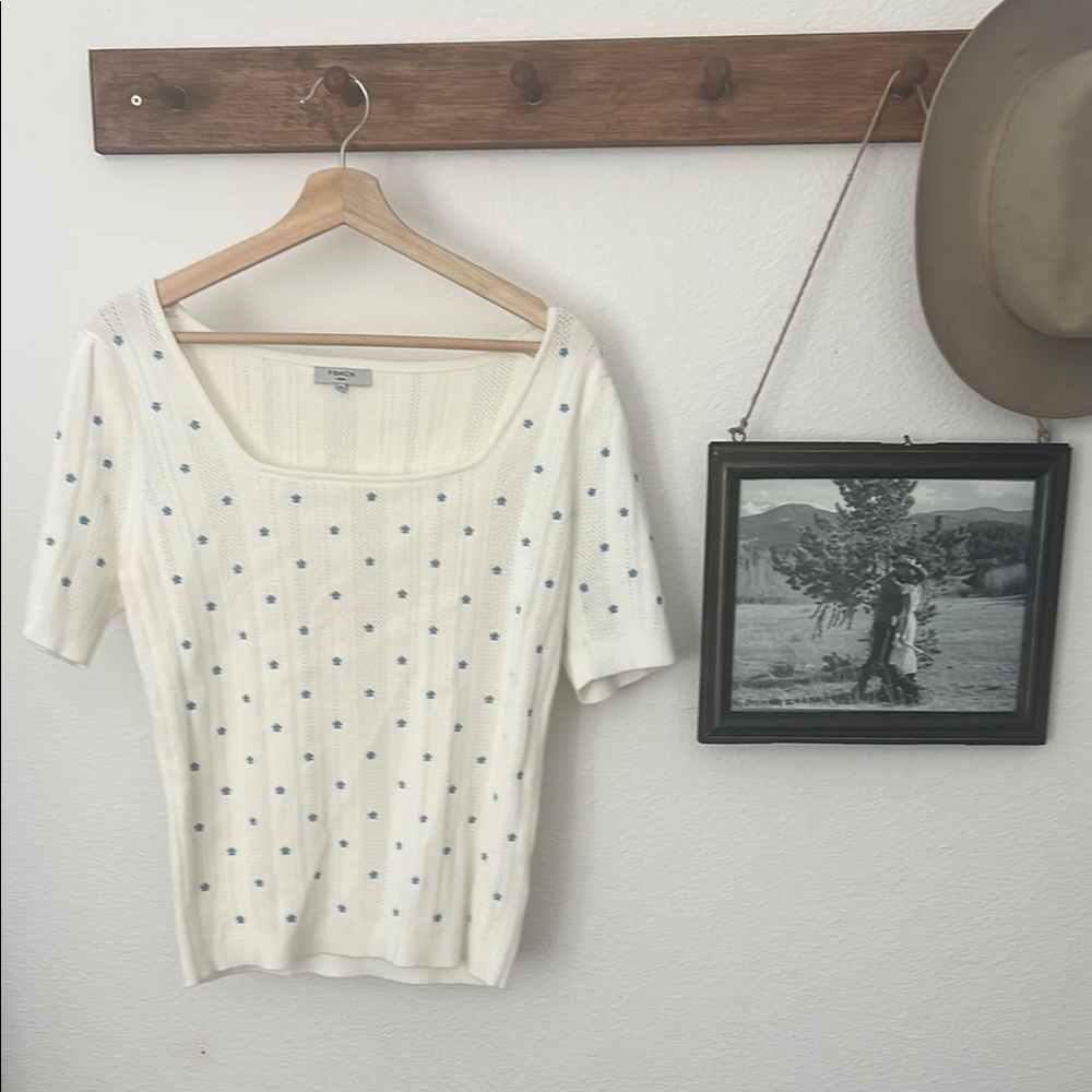 White Knit Top with Blue embroidered flower detail
